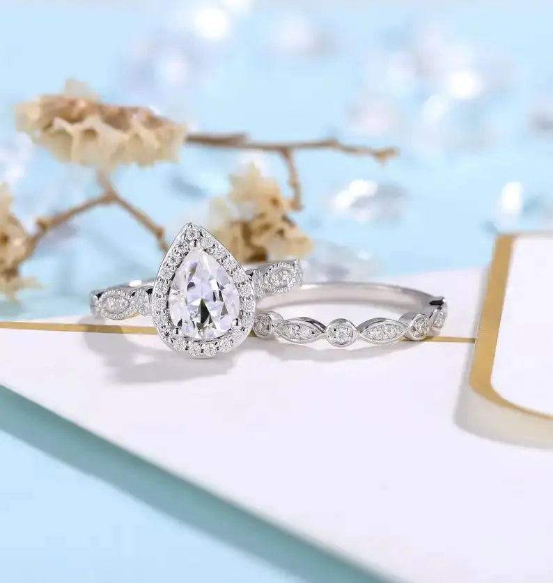 18K WHITE GOLD PEAR CUT MOISSANITE HALO ENGAGEMENT RING 1CT Moissanite Engagement Rings & Jewelry | Luxus Moissanite Pear Cut Moissanite Engagement Rings