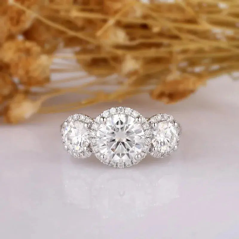 14K WHITE GOLD THREE STONE HALO MOISSANITE ENGAGEMENT RING Moissanite Engagement Rings & Jewelry | Luxus Moissanite | Three Stone Halo Engagement Ring