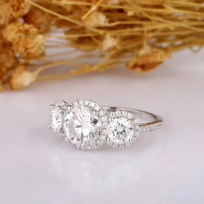 14K WHITE GOLD THREE STONE HALO MOISSANITE ENGAGEMENT RING Moissanite Engagement Rings & Jewelry | Luxus Moissanite | Three Stone Halo Engagement Ring