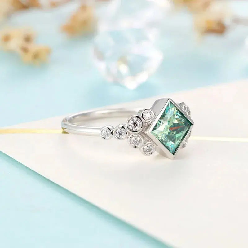 18K WHITE GOLD GREEN PRINCESS CUT MOISSANITE ENGAGEMENT RING 1CT Moissanite Engagement Rings & Jewelry | Luxus Moissanite BEST PRINCESS CUT MOISSANITE RING!