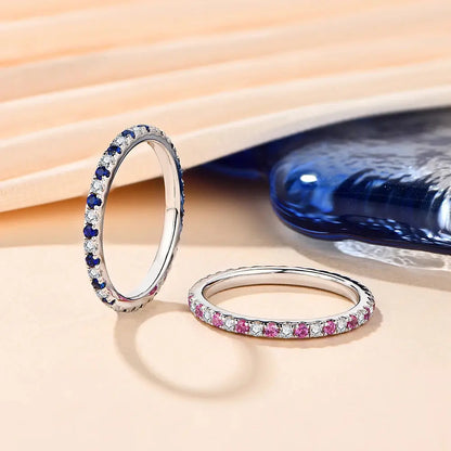 Gold or Silver 1.5mm Moissanite Eternity Ring with Pink Sapphire Colors .5ctw Moissanite Engagement Rings & Jewelry | Luxus Moissanite