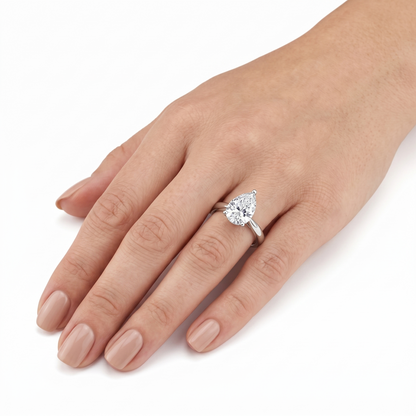 Platinum Plated Silver Pear Cut Solitaire Moissanite Ring .5ct