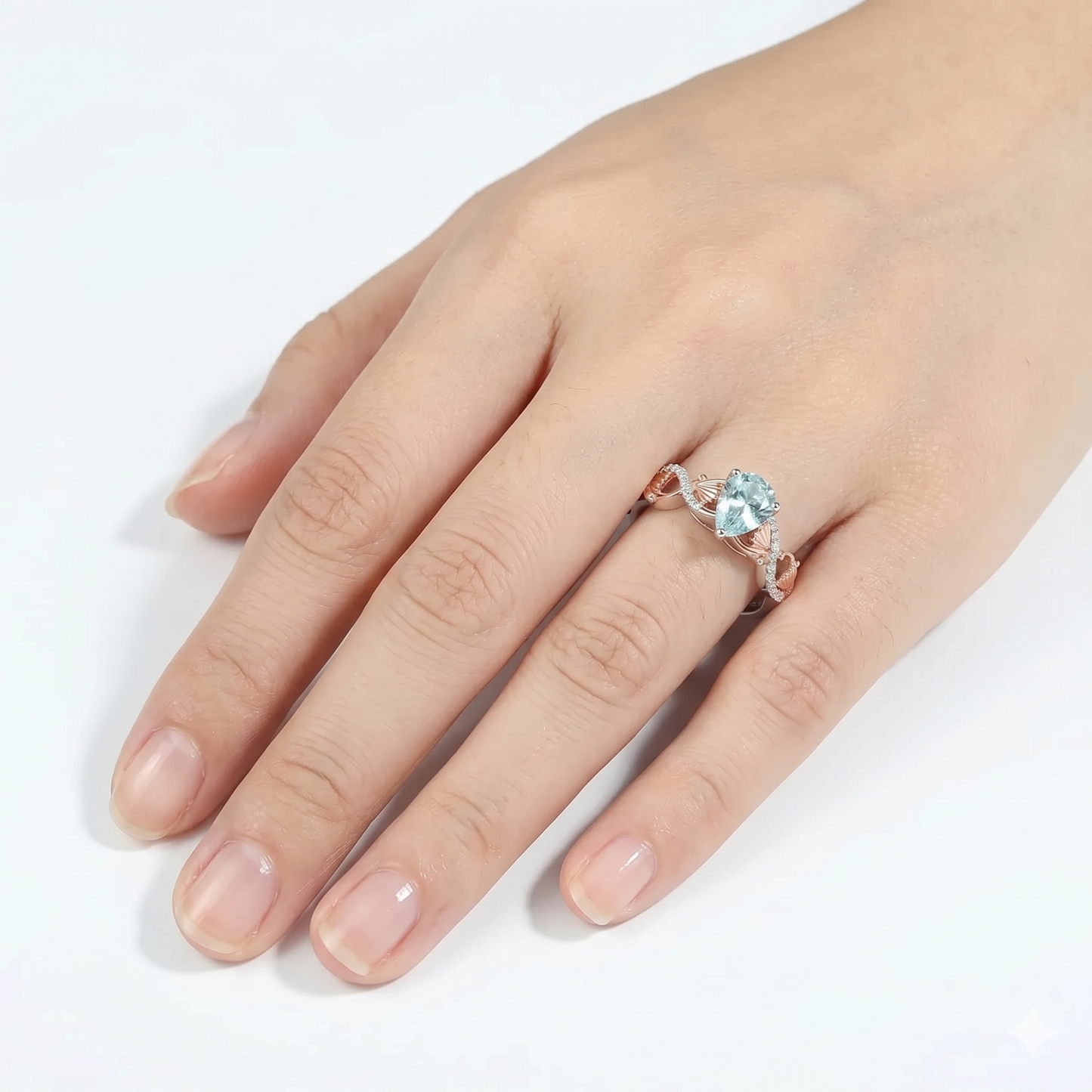 White And Rose Gold Blue Pear Cut Moissanite Engagement Ring 1ct